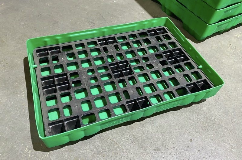 Bac au sol avec sa mission à l'intérieur