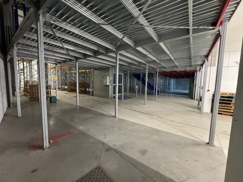 En bas